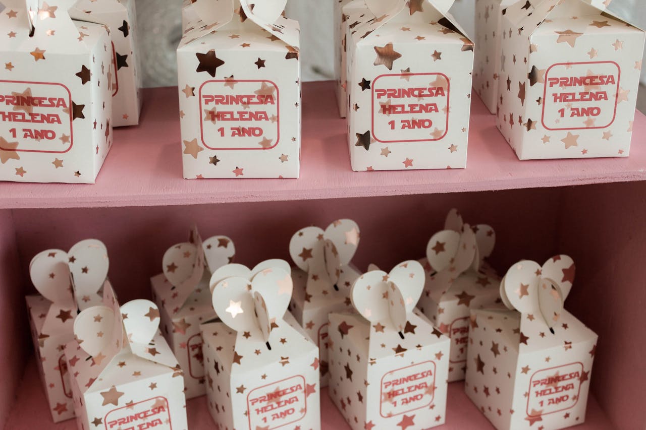 Cute birthday favor boxes for Princess Helena's 1st birthday, decorated with stars.