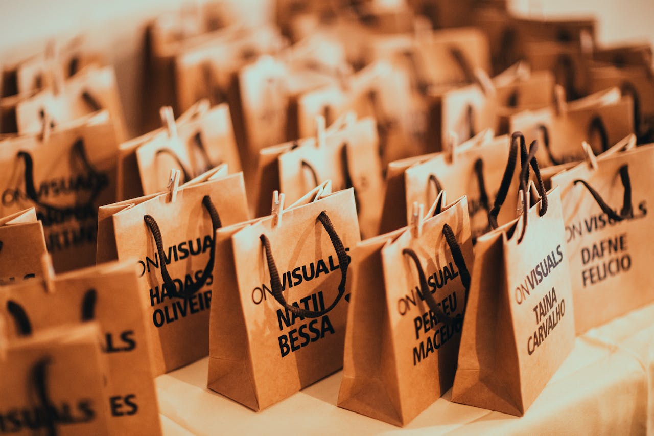 journey Close-up of eco-friendly paper bags with rope handles, ideal for events and packaging.