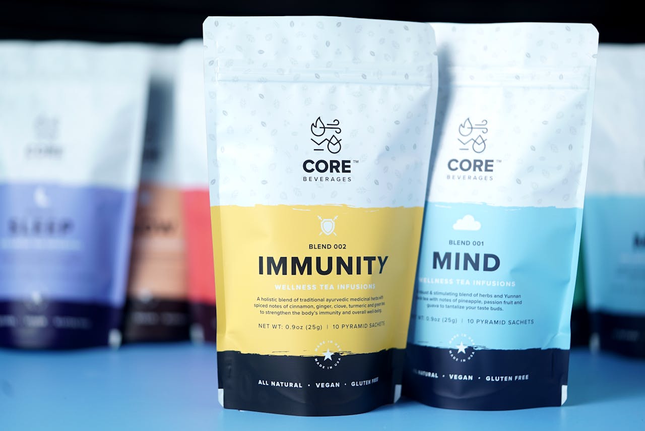 services-03 Vibrant packaging of wellness tea blends highlighted with focus on immunity and mind infusions.